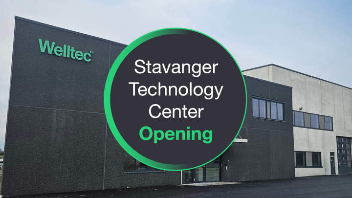 Welltec building with a circular sign announcing the opening of the Stavanger Technology Center.
