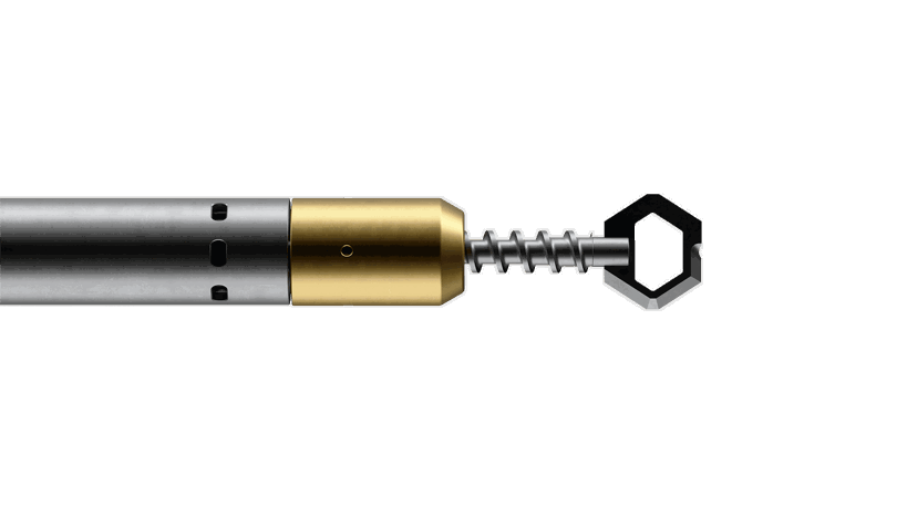 Well Cleaner Dry Environment tool with a metallic body, gold-colored section, and helical screw for efficient cleaning operations.